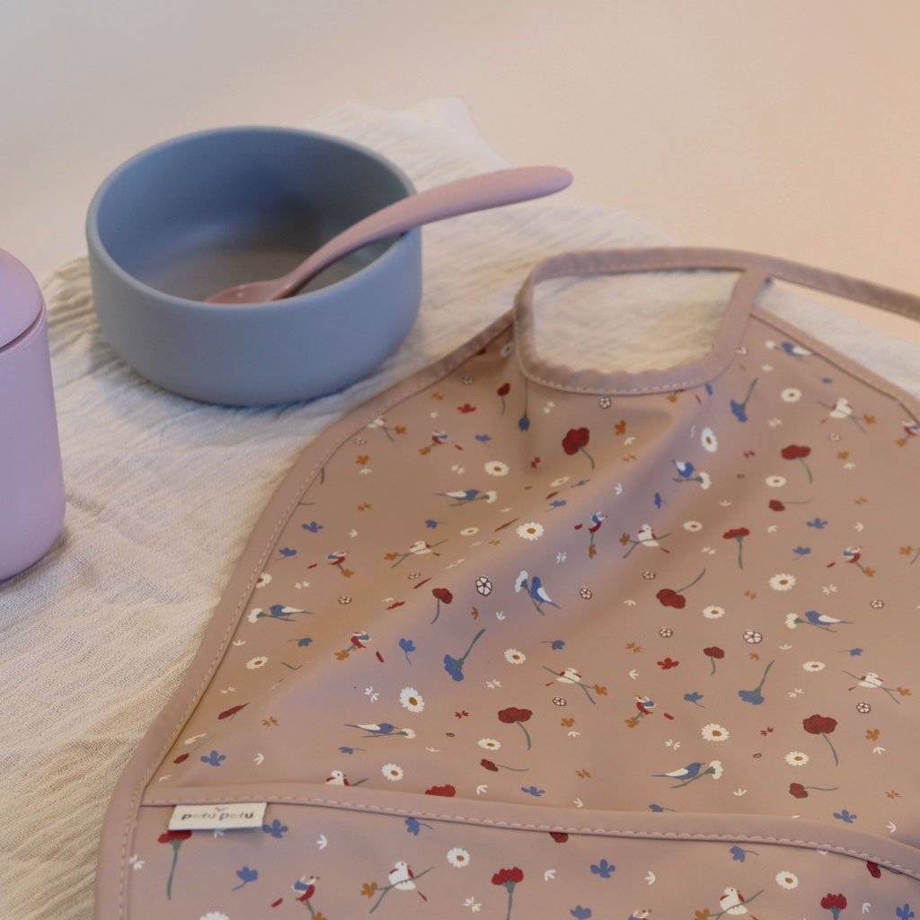 Cena slabbetje met knoeizakje bloem/vogel